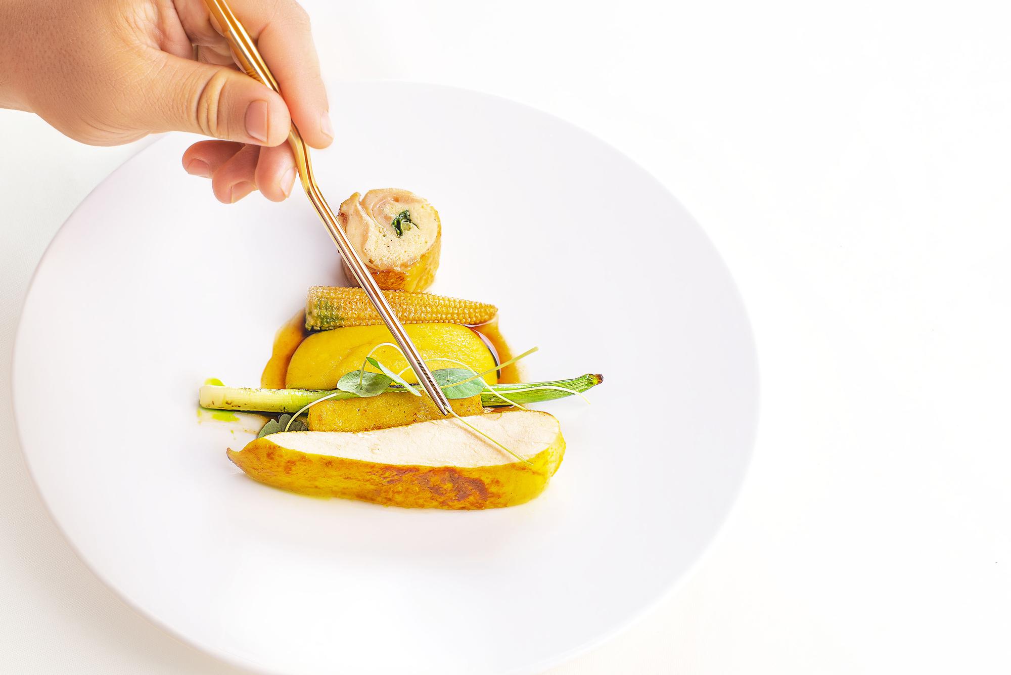 Close-up plated seasonal dish from student