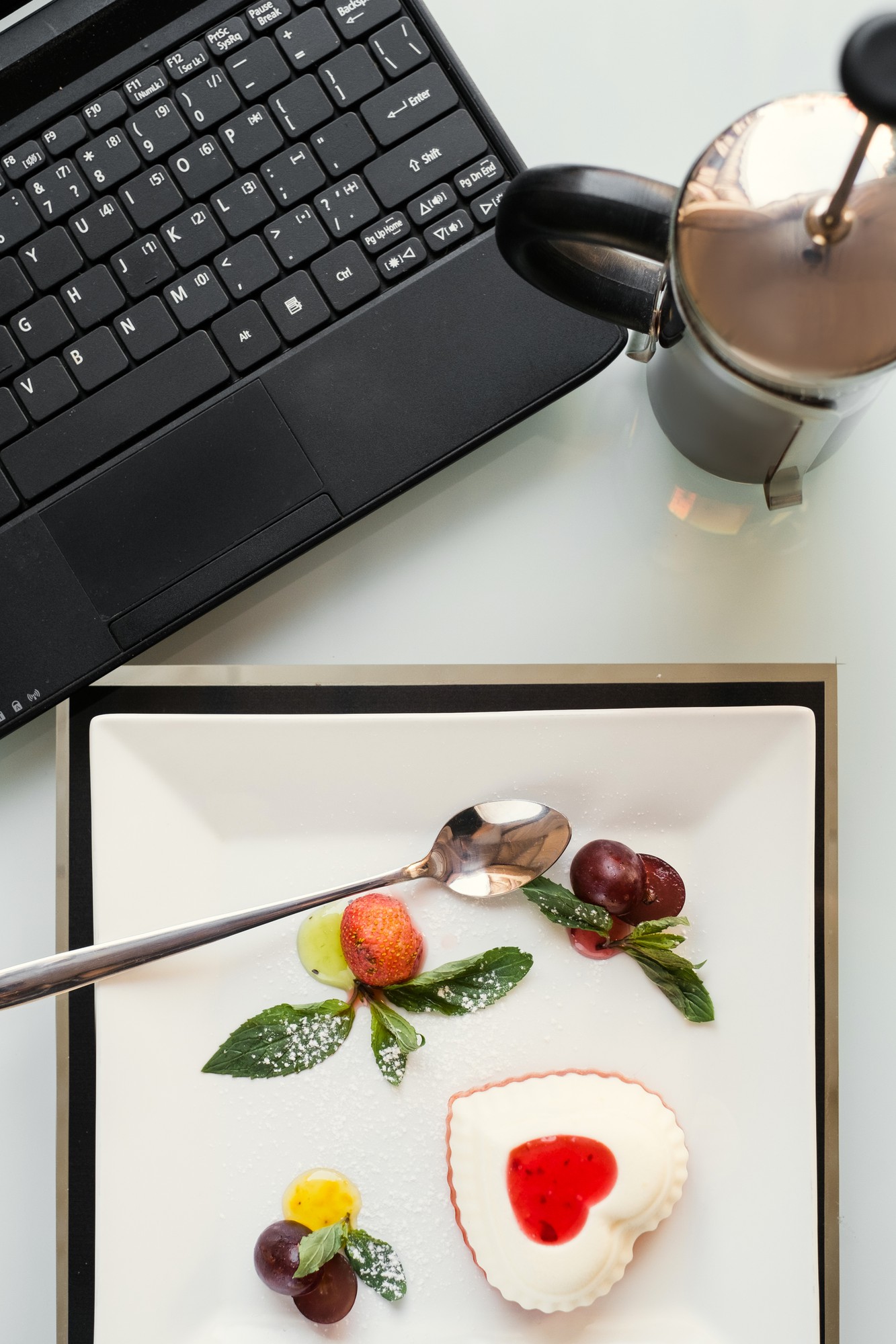 Compact montage showing course workbook and plated dishes